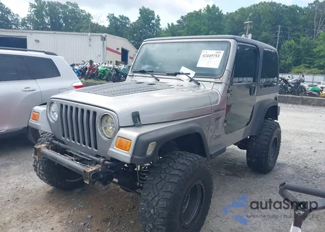 2002 Jeep Wrangler Sport from USA, damaged, VIN 1J4FA49S52P717811